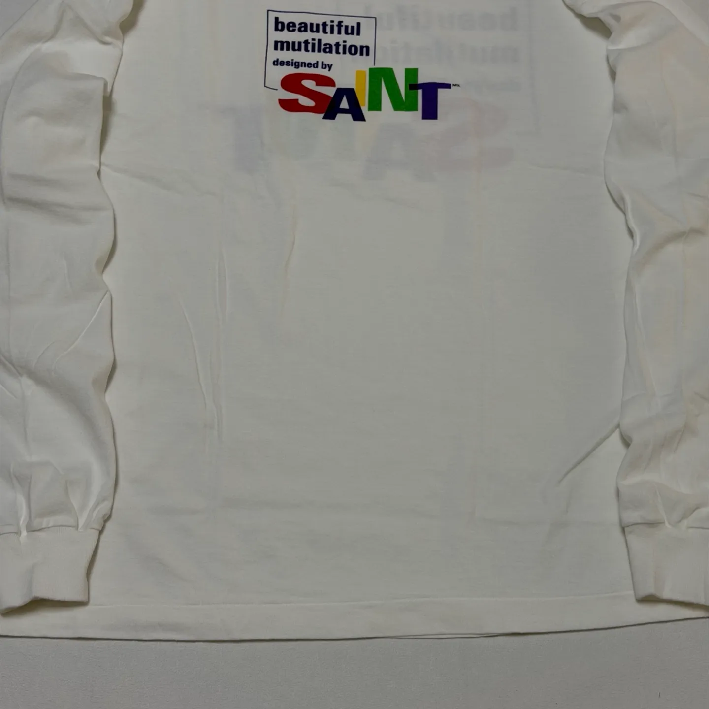 SAINT Mxxxxxx LS TEE/BEAUTIFUL SAINT/WHT Colorful SAINT slogan long-sleeved TEE White S-XL Cylindrical side seamless fabric Really made with care! Domestic printing factory OEM, original water slurry non-touch printing process, correct version, correct main mark/wash mark/little angel anti-counterfeiting mark